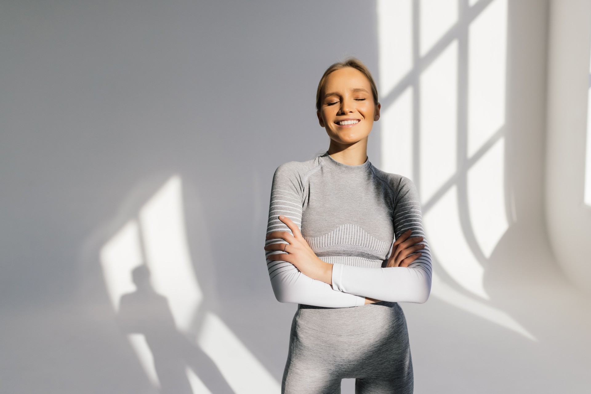 portrait of young brunette fitness woman at gym